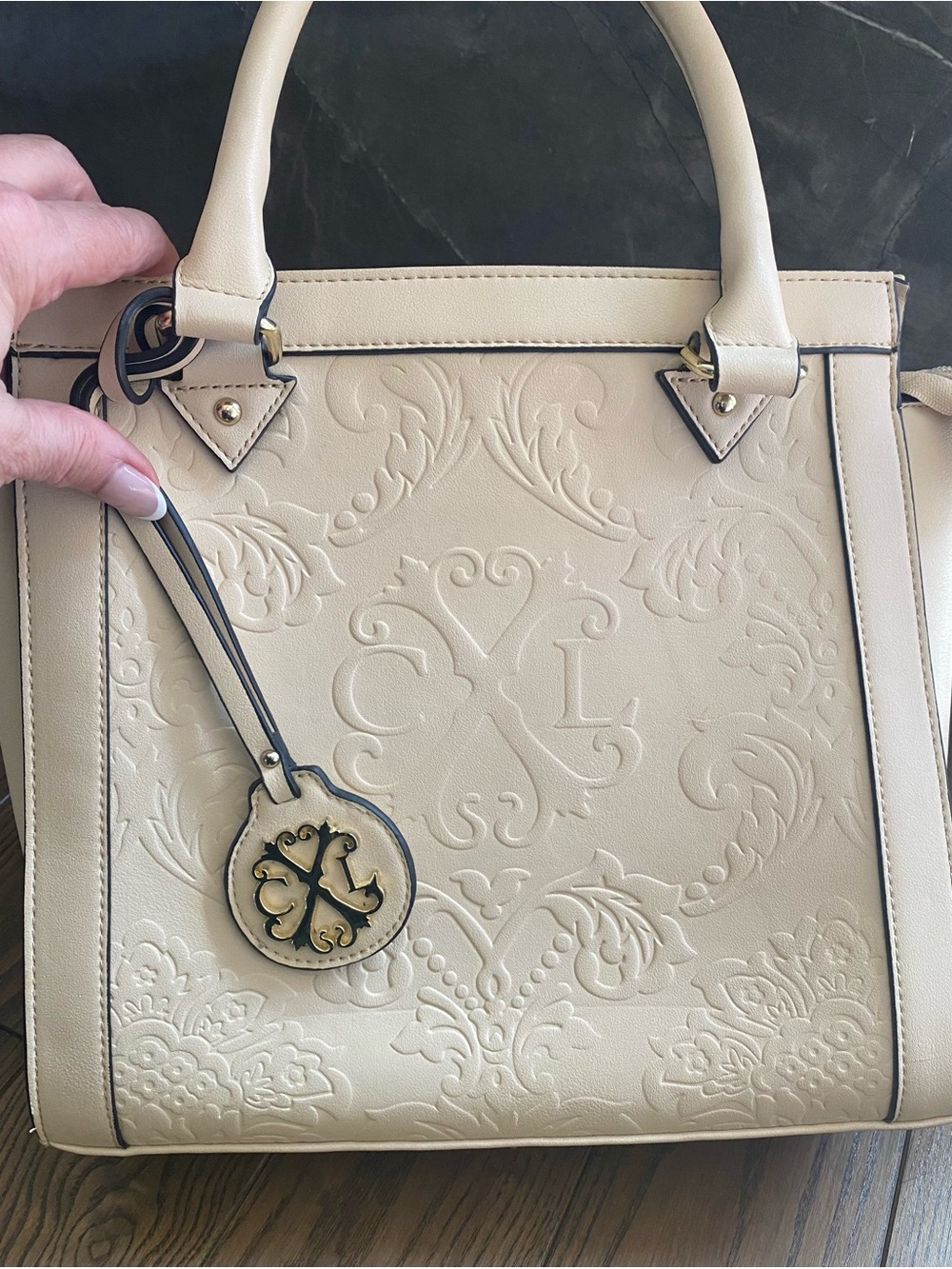 Christian Lacroix Embossed Leather Tote w Logo Charm( detachable) 
Cream colour